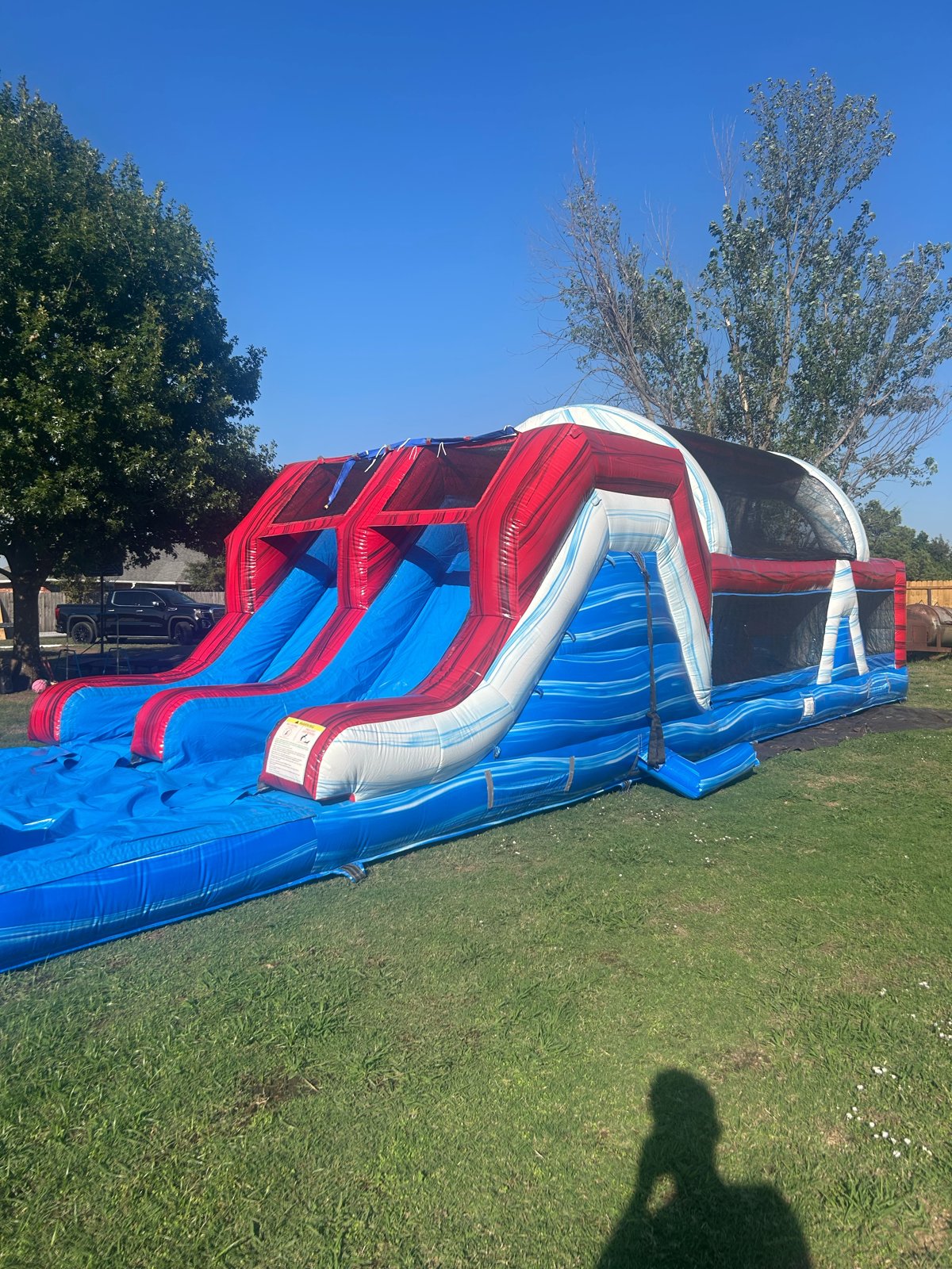 Slide end of a marble-themed inflatable obstacle course in Calera, OK