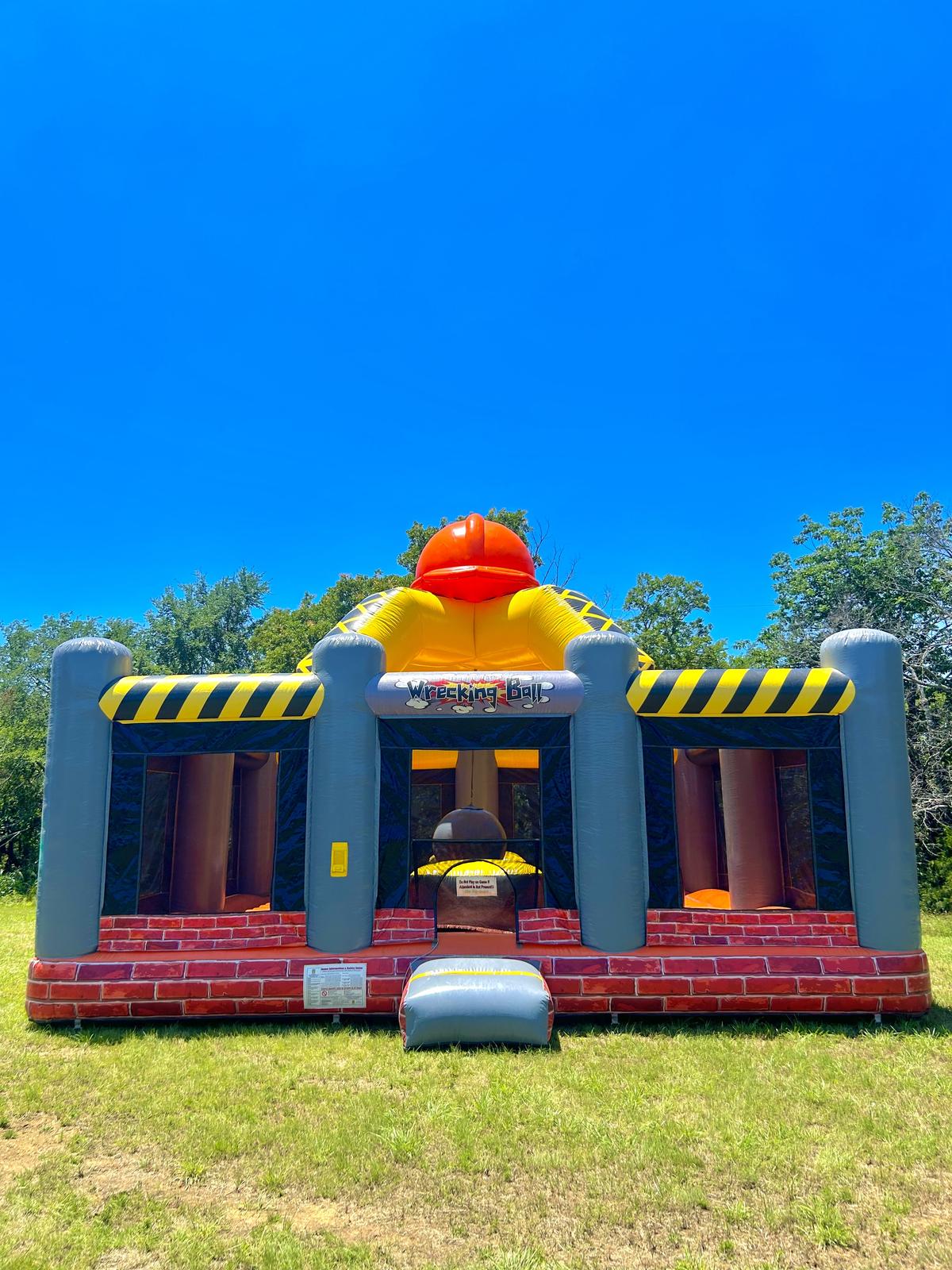 XL Wrecking Ball bounce house set up on grass for a Pottsboro, TX party